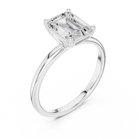 Sophisticated Step Cut Emerald Solitaire Ring