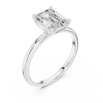 Sophisticated Step Cut Emerald Solitaire Ring