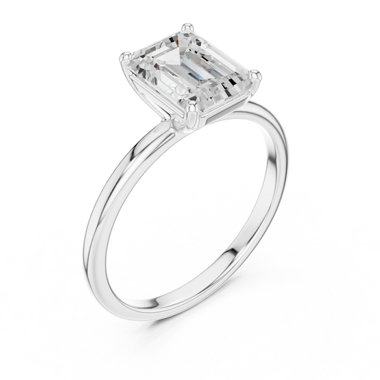 Sophisticated Step Cut Emerald Solitaire Ring