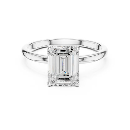Sophisticated Step Cut Emerald Solitaire Ring