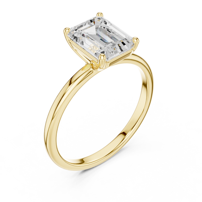 Sophisticated Step Cut Emerald Solitaire Ring