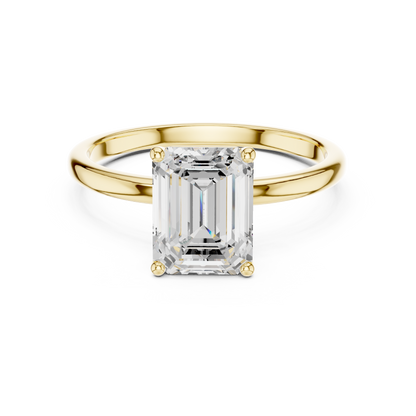 Sophisticated Step Cut Emerald Solitaire Ring